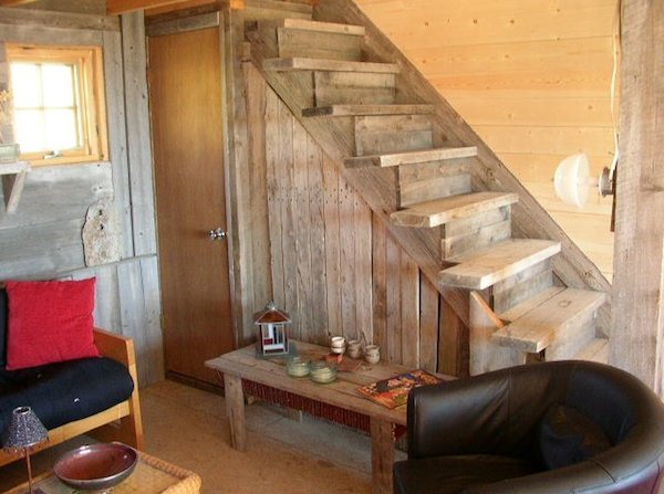 Storage in living area of small rustic cabin