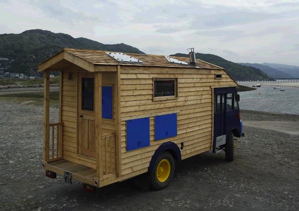 wooden-house-truck-1954-army-firetruck-01 wooden house truck 1954 army firetruck 01 Tiny House Built on a 1954 Goddess Firetruck: Self Sufficient Wooden House Truck